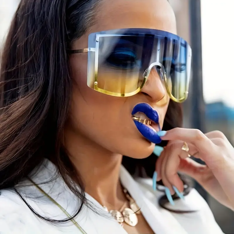 Woman In Trendy Sunglasses